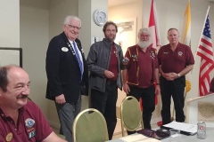 DG Cec Specht welcoming new member Ross McIntyre to our club, with Steve W & President Brian