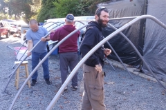 Putting up the storage tent